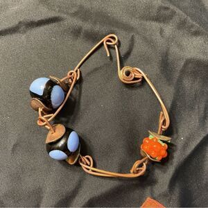Artisan Copper Wire Bracelet with Blue and Orange Beads